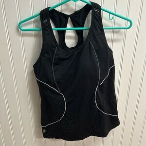 Athleta Running top with a pouch in the back. Bra padded. Size M